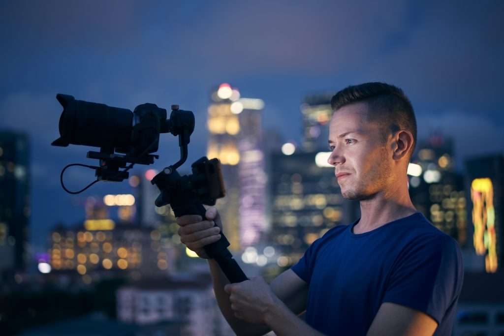 portrait of videographer with camera and gimbal 2022 07 06 01 37 24 utc 1